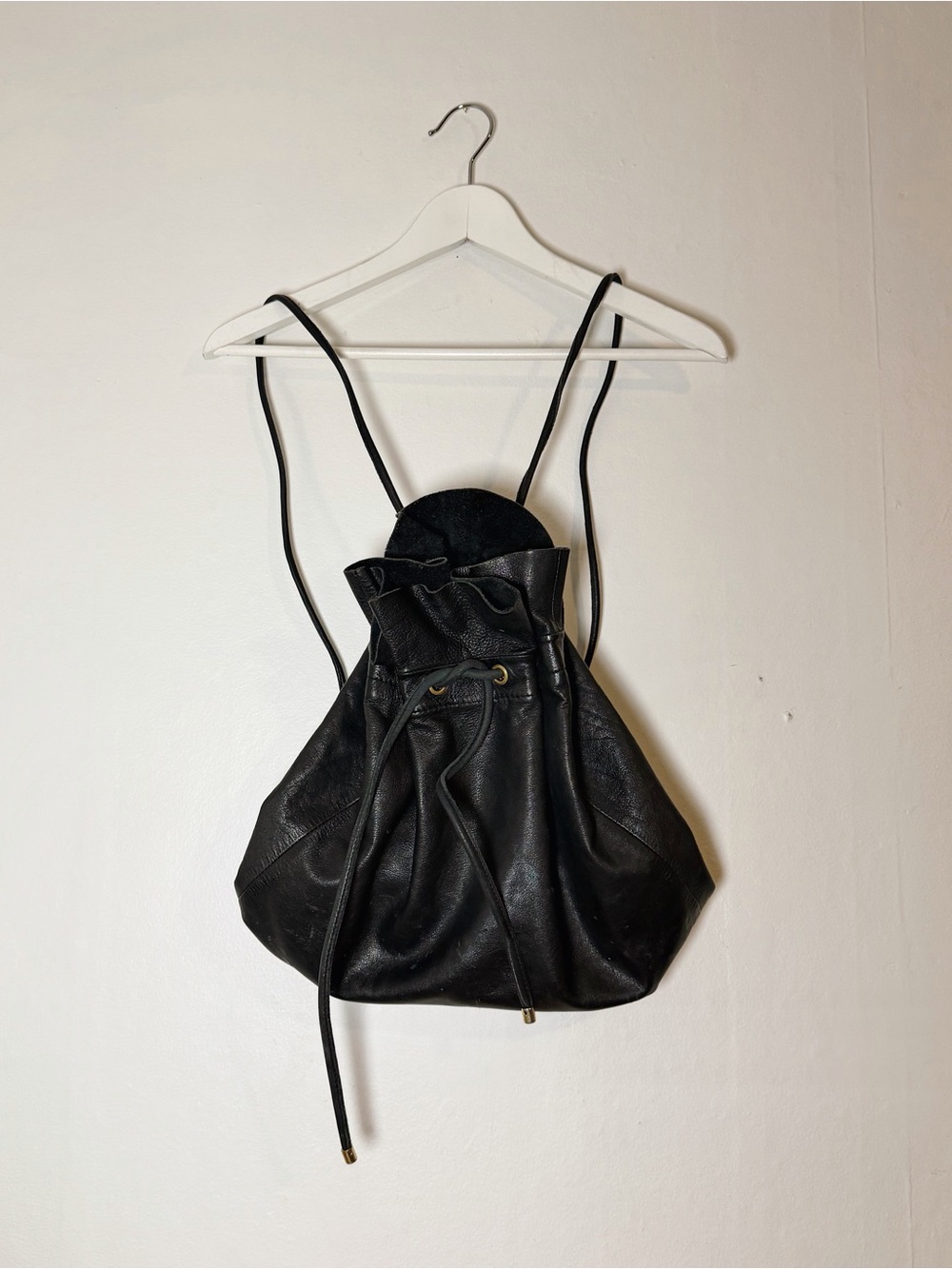 COS Raw-Cut Drawstring Leather Backpack